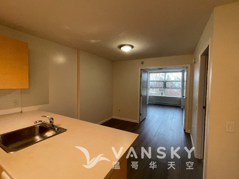 250417130700_208 Kitchen view to living room and Den .jpg